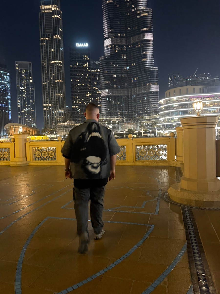Walking toward the Burj Khalifa in Downtown Dubai at night