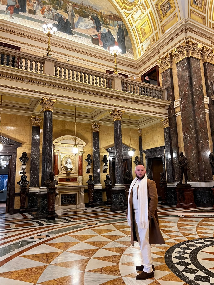 Standing in the grand hall of the National Museum in Prague